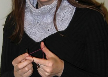knitting hands and mid chest region displayed